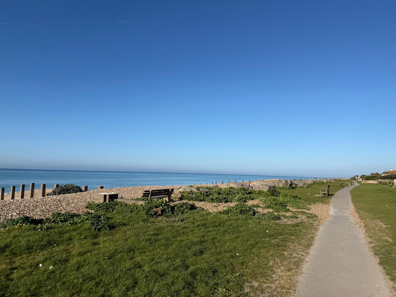 Coastal path and sea view on a clear day.